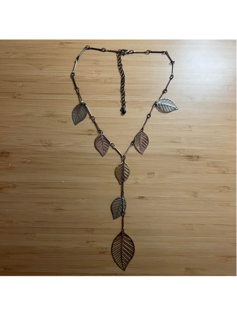 Multi-metal boho style lariat necklace with leaf charms